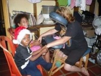Massage for flood victims in Centro Madre